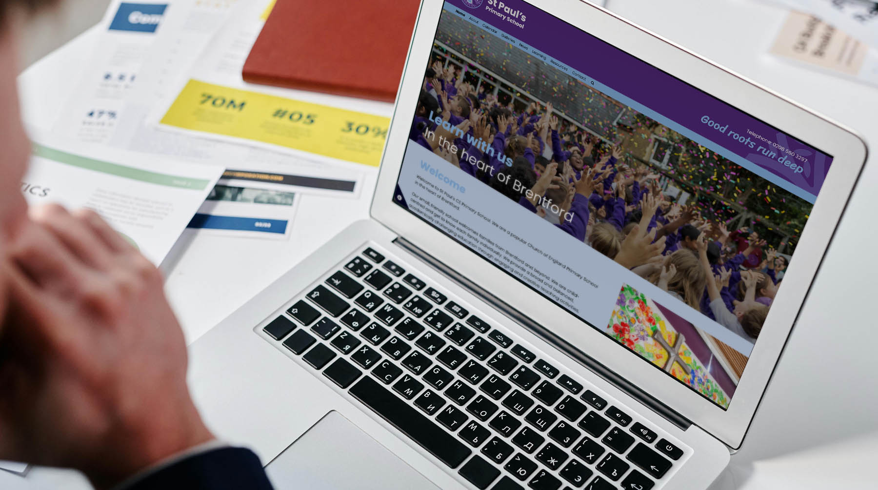 Website code and design work on a laptop